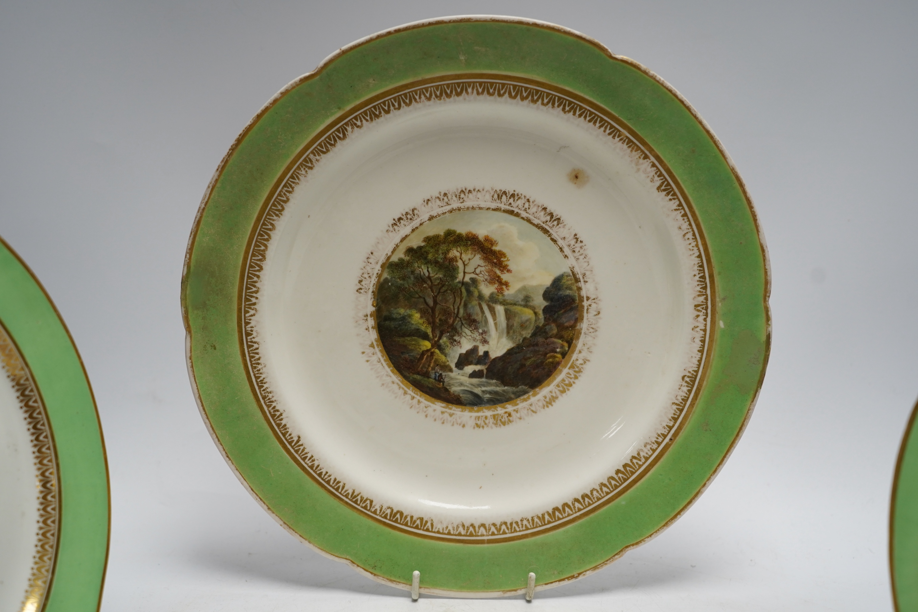 Three Derby landscape plates, attributed to George Robertson, c.1795, two decorated with Scottish scenes, the other Italian scene and a Chamberlains Imari pattern plate, 25cm (4)